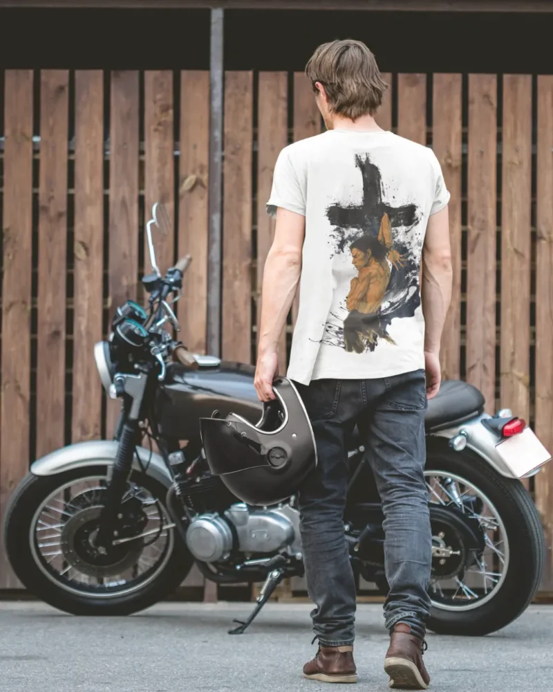 Oversized streetwear t-shirt featuring manga-inspired martial art pose against a painted cross background.