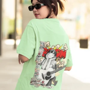 Oversized streetwear t-shirt featuring manga girl with guitar, books, and comic pop-art explosion background.
