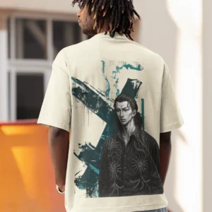 Oversized streetwear t-shirt featuring manga-inspired solemn man with embroidered shirt, teal brush strokes in the background.