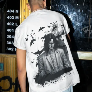 Oversized streetwear t-shirt featuring manga-inspired figure with crows and rising shadows in monochrome design.