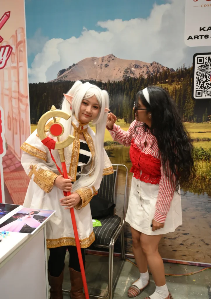 IAN Host trying to touch the ear of Frieren