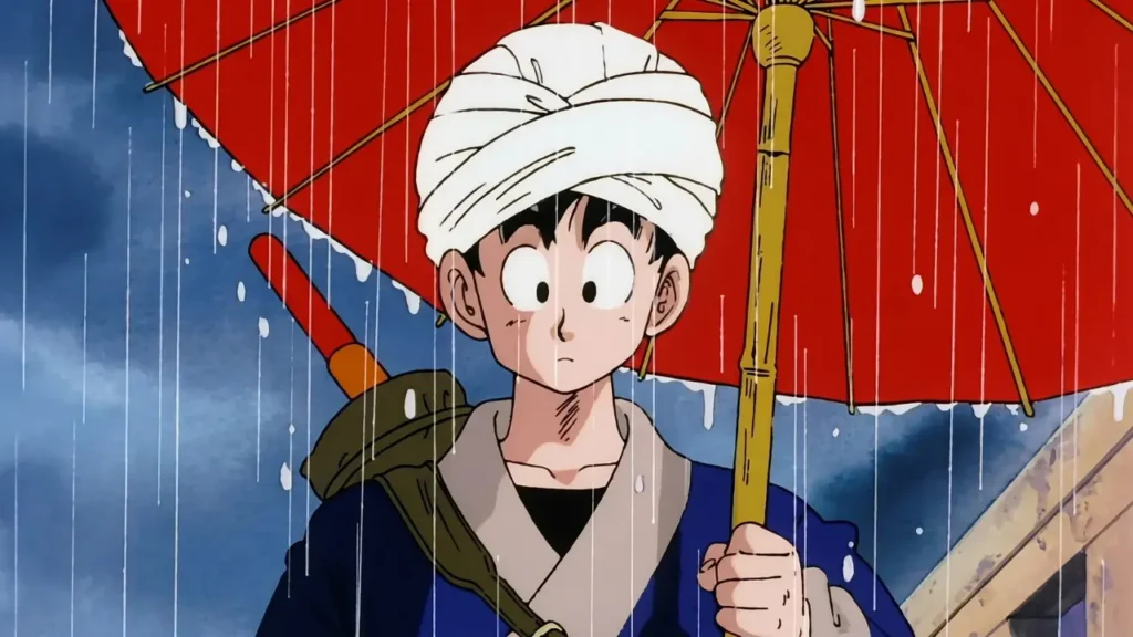 Goku's iconic blue robe and turban outfit: at the beginning of the 23rd World Martial Arts Tournament (Tenkaichi Budokai) in the original Dragon Ball series